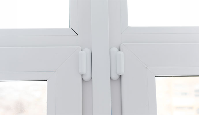 An installed window security motion sensor
