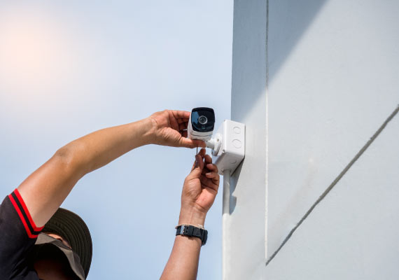 technician installing cctv camera