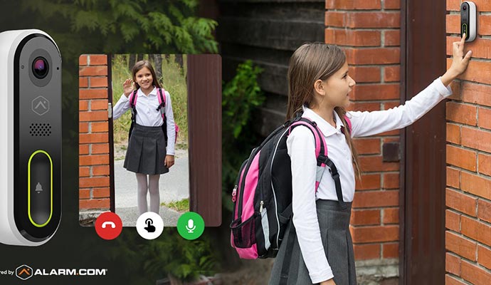 A girl operating smart video doorbell system 