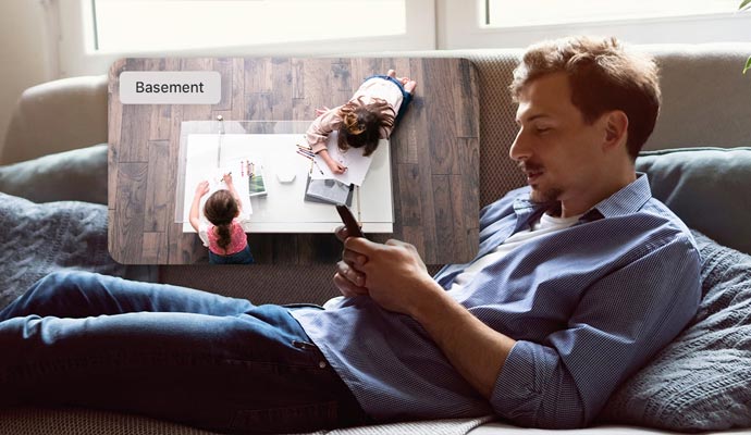 Person using smart home security app
