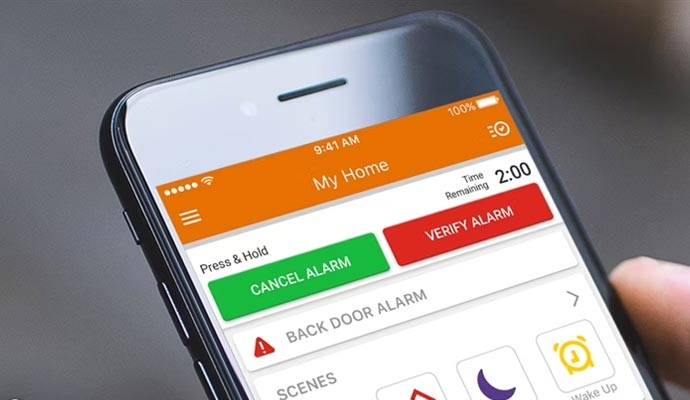 Person using smart home security app