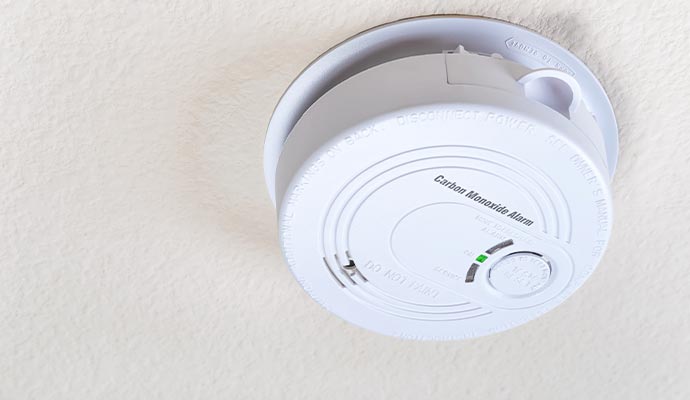 Installed carbon monoxide detector mounted on ceiling