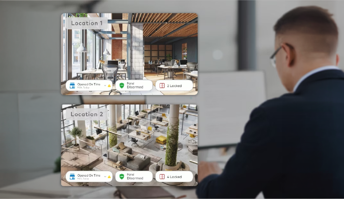Business owner monitoring security status access control and surveillance across multiple commercial locations
