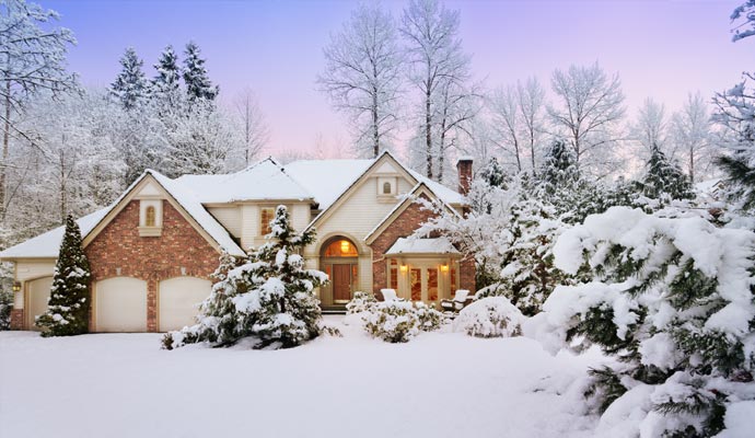 Night fall snow covered the home roof