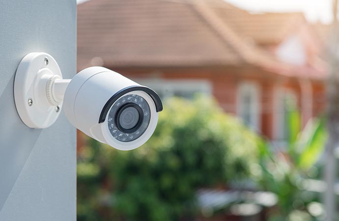 Security camera installed to observe events in a private house community.