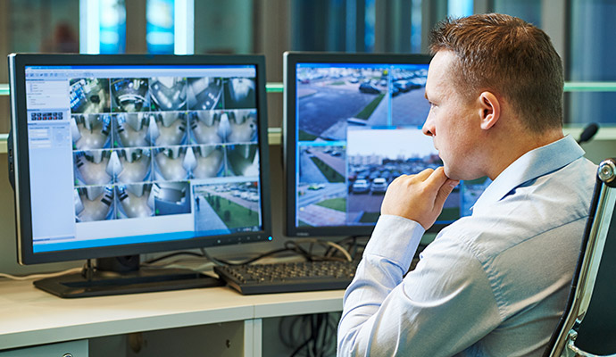 Expert monitoring video surveillance in the control room